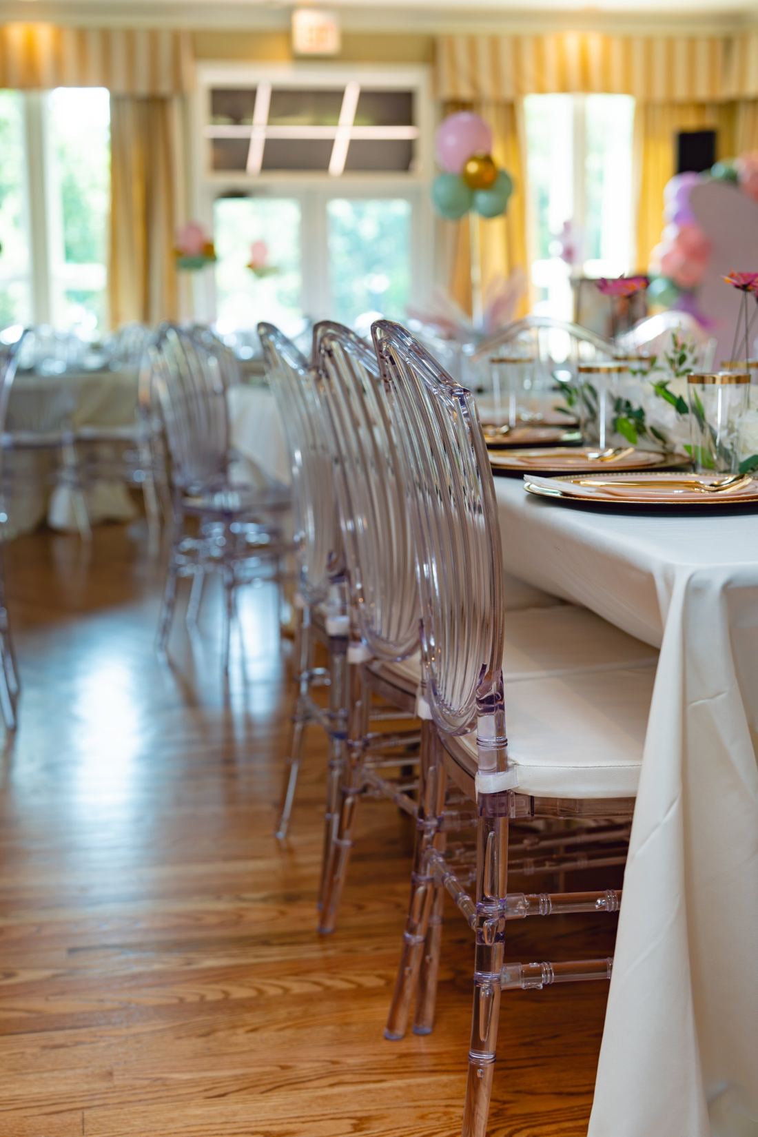 Styled room with ghost chairs ready for guests